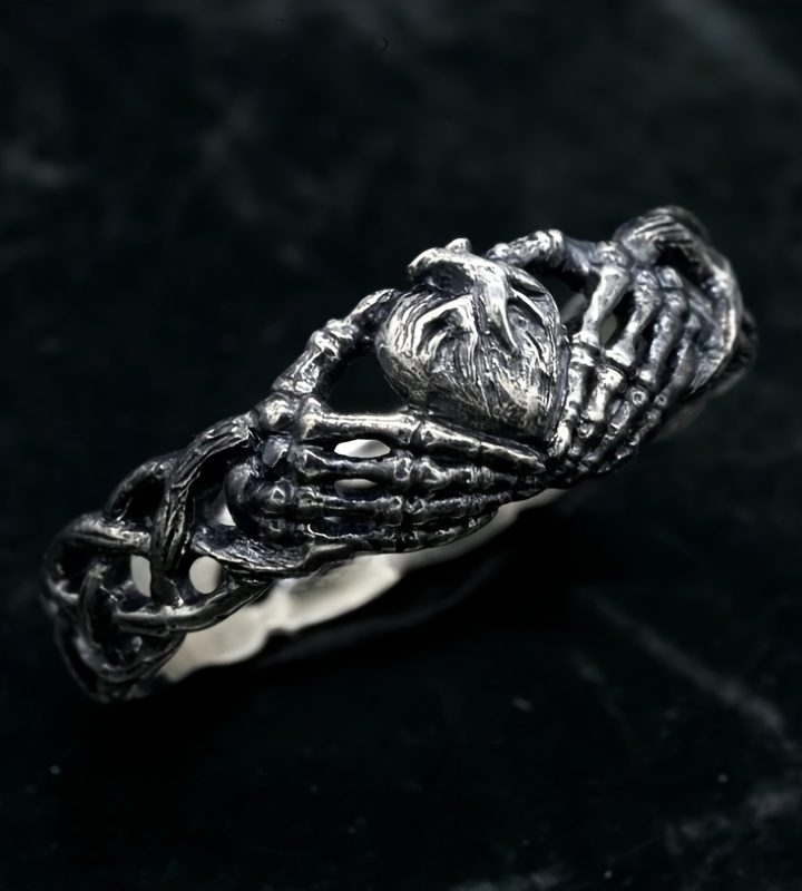 Celtic Retro Heart Hugging Hand Ring