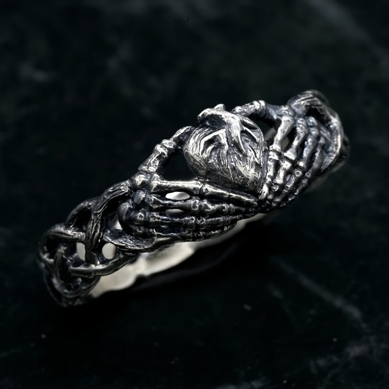 Celtic Retro Heart Hugging Hand Ring Celtic Retro Heart Hugging Hand Ring