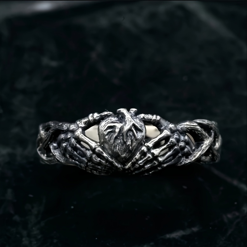 Celtic Retro Heart Hugging Hand Ring Celtic Retro Heart Hugging Hand Ring
