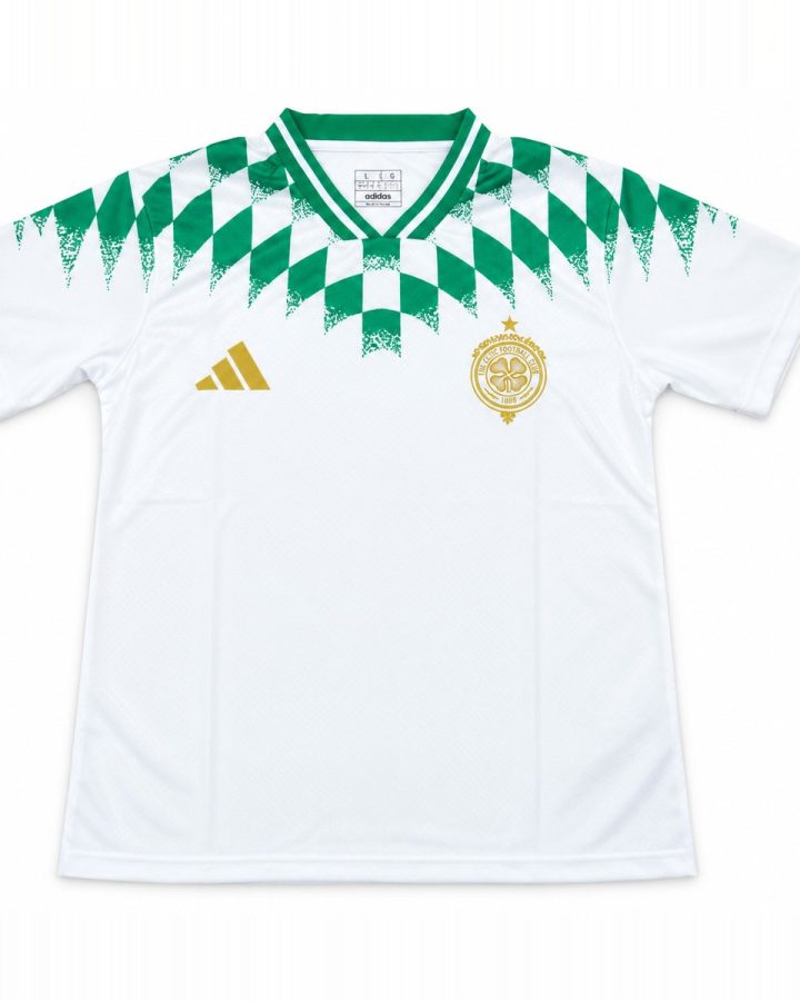 White Celtic training shirt with green diamond pattern and gold crest