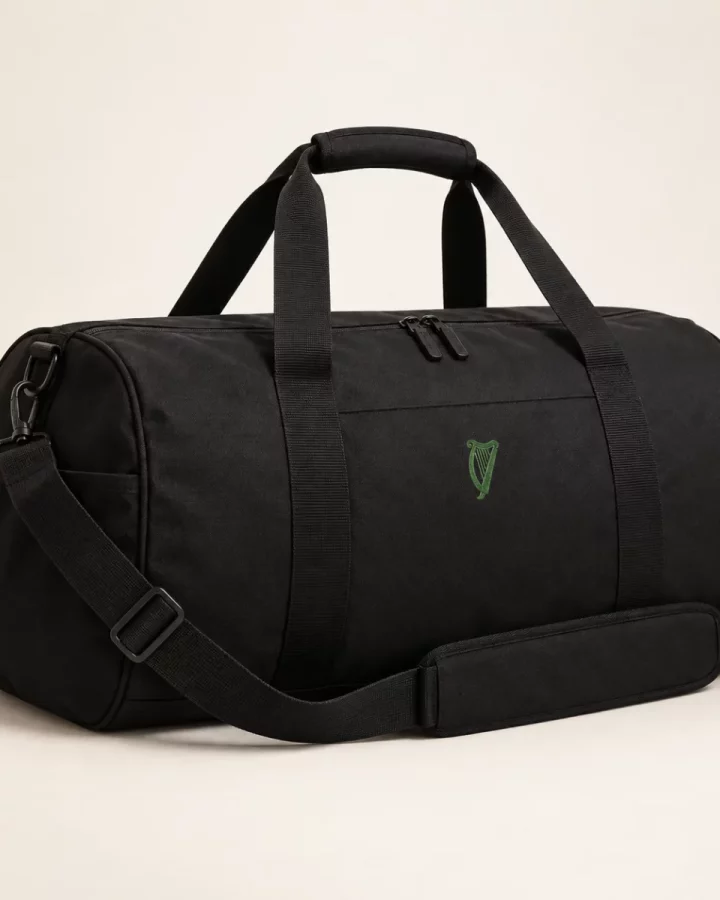 Black District Gym Bag design mock-up: Black duffel silhouette; green harp; tonal handles and strap