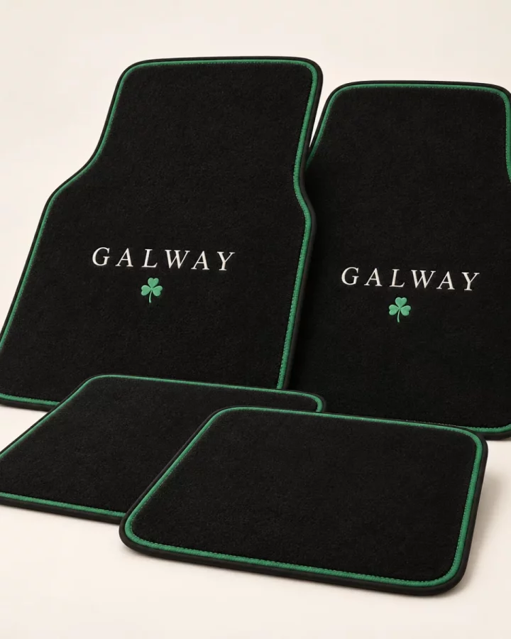 Black County Name Car Mat Set design mock-up: Black mat design with GALWAY sample text; green piping; sample personalisation only