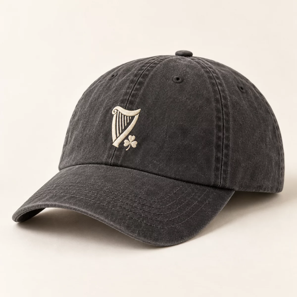 Vintage Harp Cap Washed charcoal Vintage Harp Cap design mock-up: Cream harp front; washed-charcoal cap; curved peak