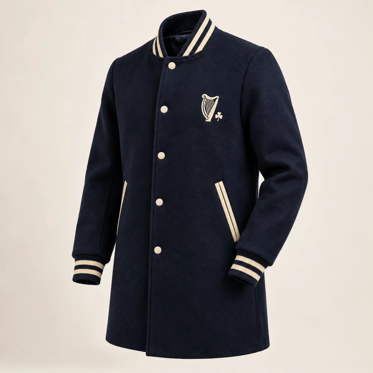 District Varsity Coat Navy District Varsity Coat design mock-up: Navy mid-thigh varsity-style coat; cream trim; small cream harp chest emblem