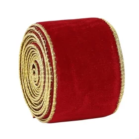 Roll of Irish-themed cloth ribbon on a wooden surface
