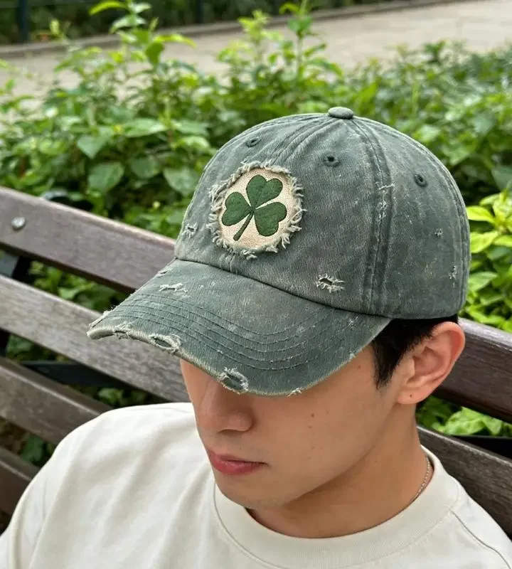 Shamrock embroidery detail on kids cap